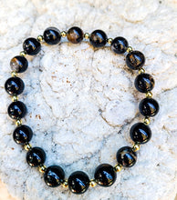Load image into Gallery viewer, Black Tourmaline Bracelet with gold spacers